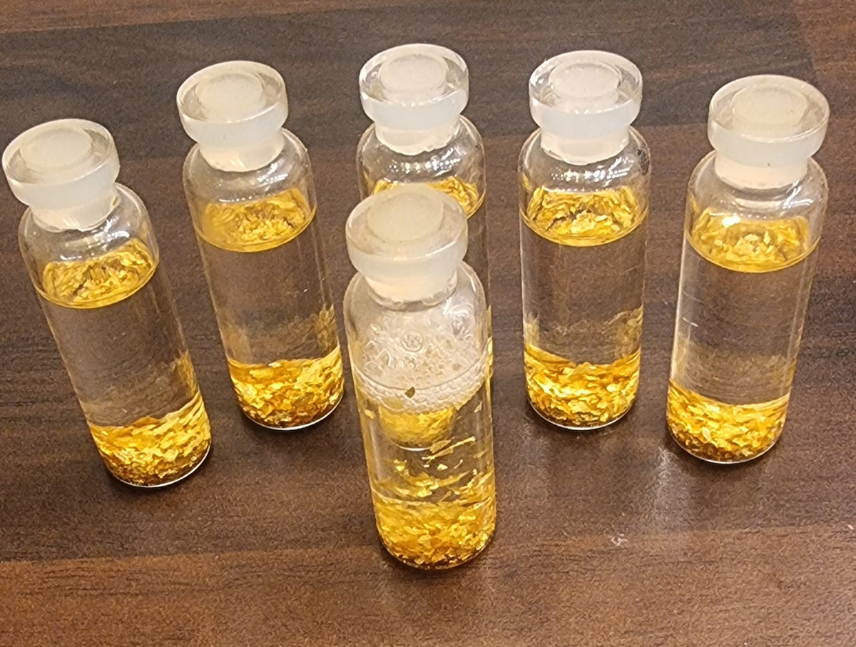 MINIFLASKE MED GULLFARGEDE DEKORFLAK