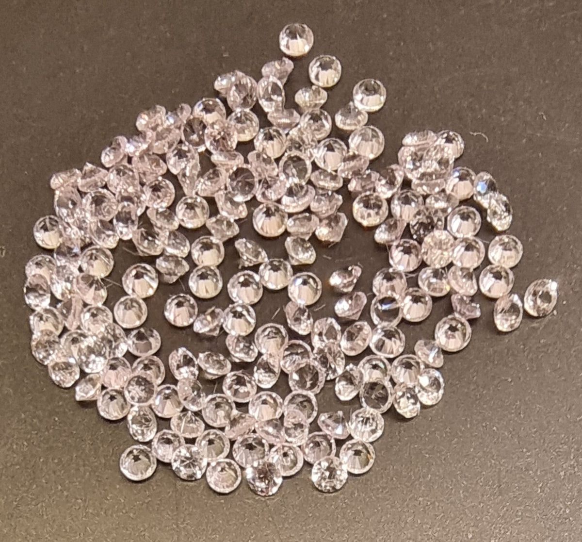 200 naturlige rosa safirer – totalt 3,26 ct