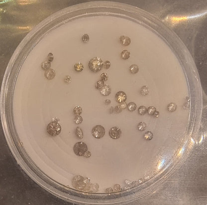68 naturlige diamanter – 0,99 ct totalt – AIG-sertifisert og forseglet